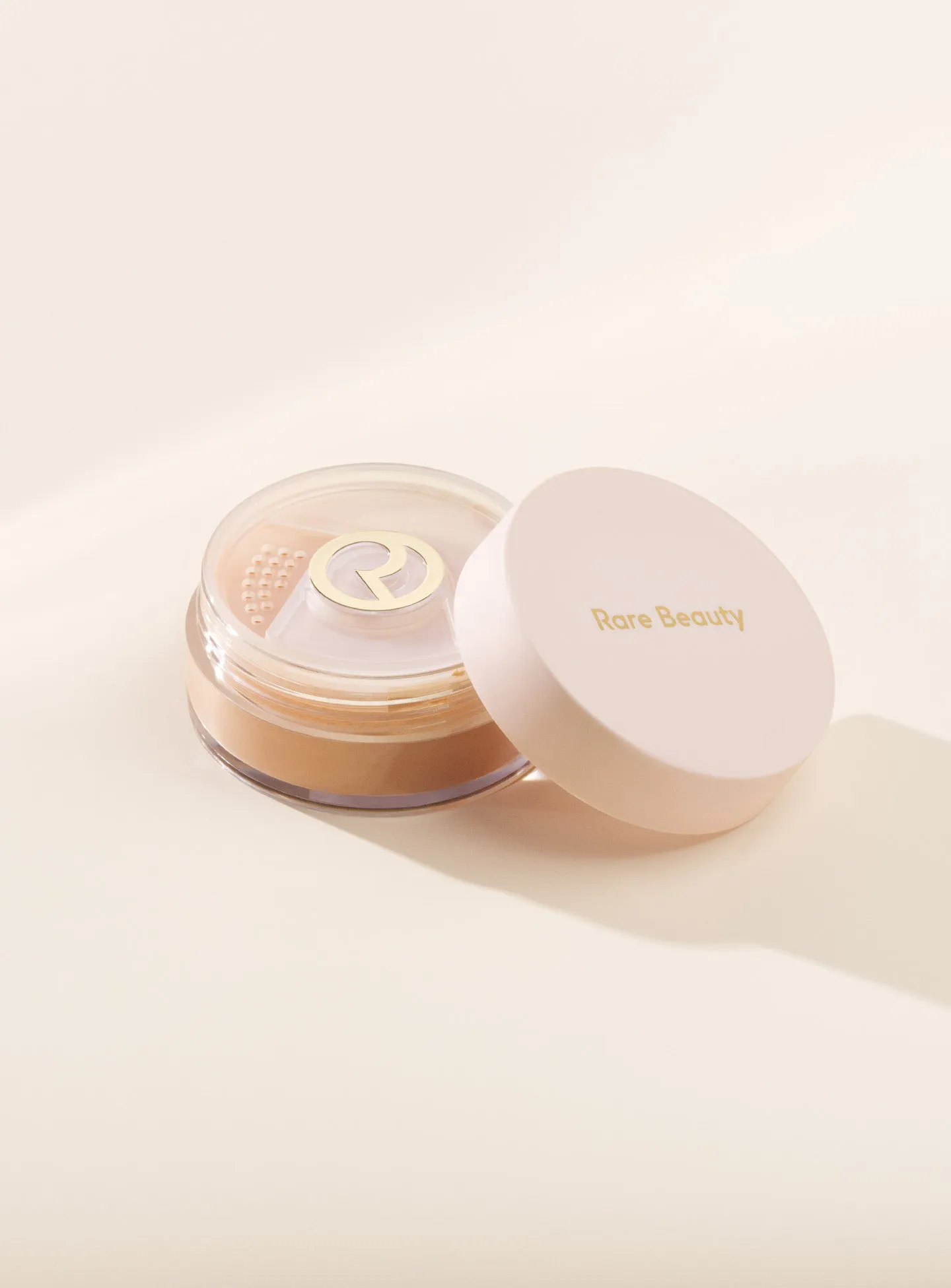 Always an Optimist Soft Radiance Setting Powder Rare Beauty